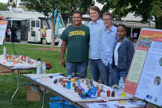 Medford, OR – Dr. Sandoval (left) and University of Oregon graduate students at the 2014 Multicultural Fair.